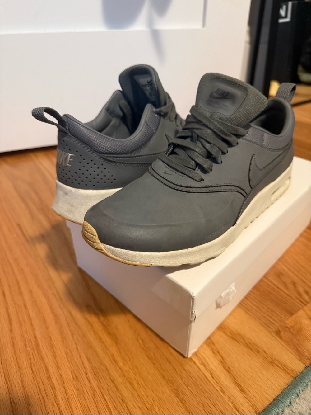 Nike women’s Charcoal Gray leather Casual Sneakers
